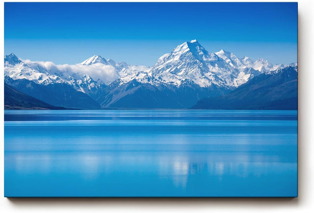 Sinus Art Wandbild 120x80cm Stimmungsvolle Alpenlandschaft mit ruhiger Wasserfläche und majestätischen Gipfeln