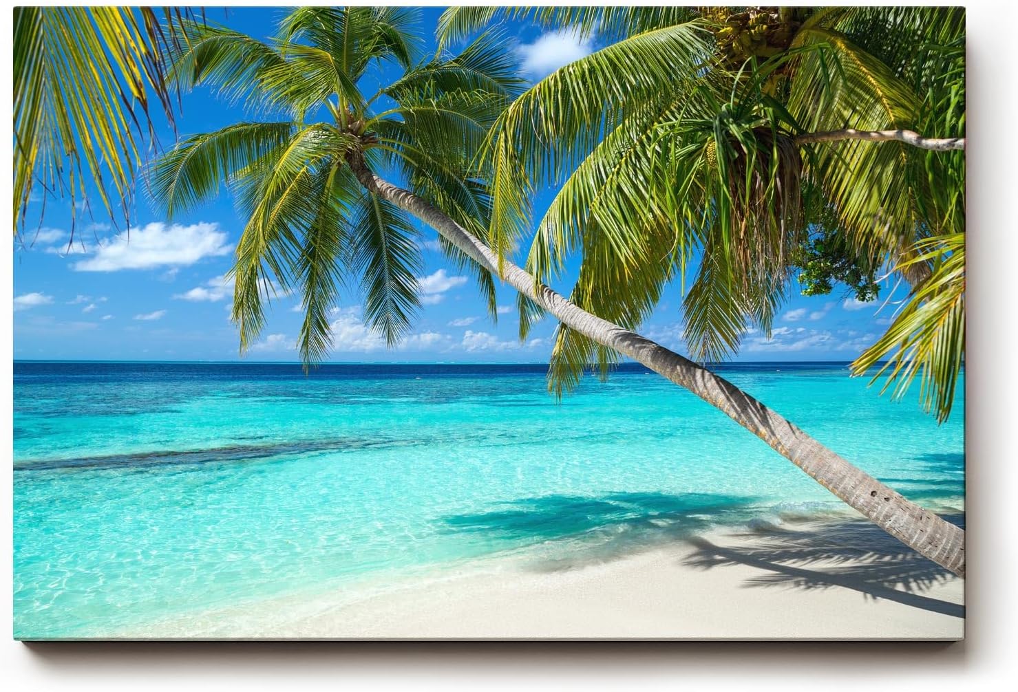 Sinus Art Wandbild 120x80cm Tropischer Strand mit weißen Sand und schattenspendenden Palmen als Urlaubsidyll