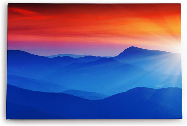 Paul Sinus Wandbild 120x80cm Gebirge Berge Blau Rot Sonnenstrahlen Bergkette